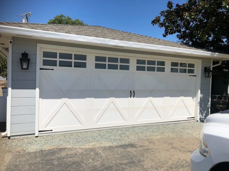 The Benefits of Adding Windows to Your Garage Door